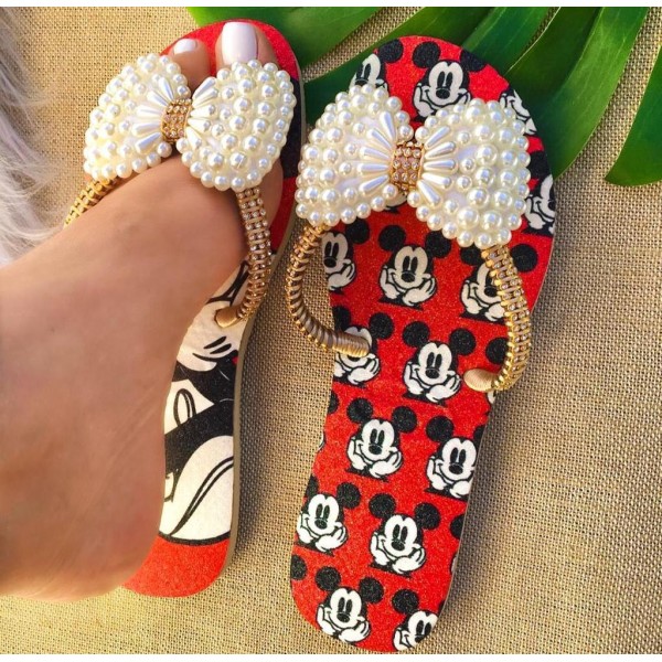 Red women slippers with a bow decorated with pearl